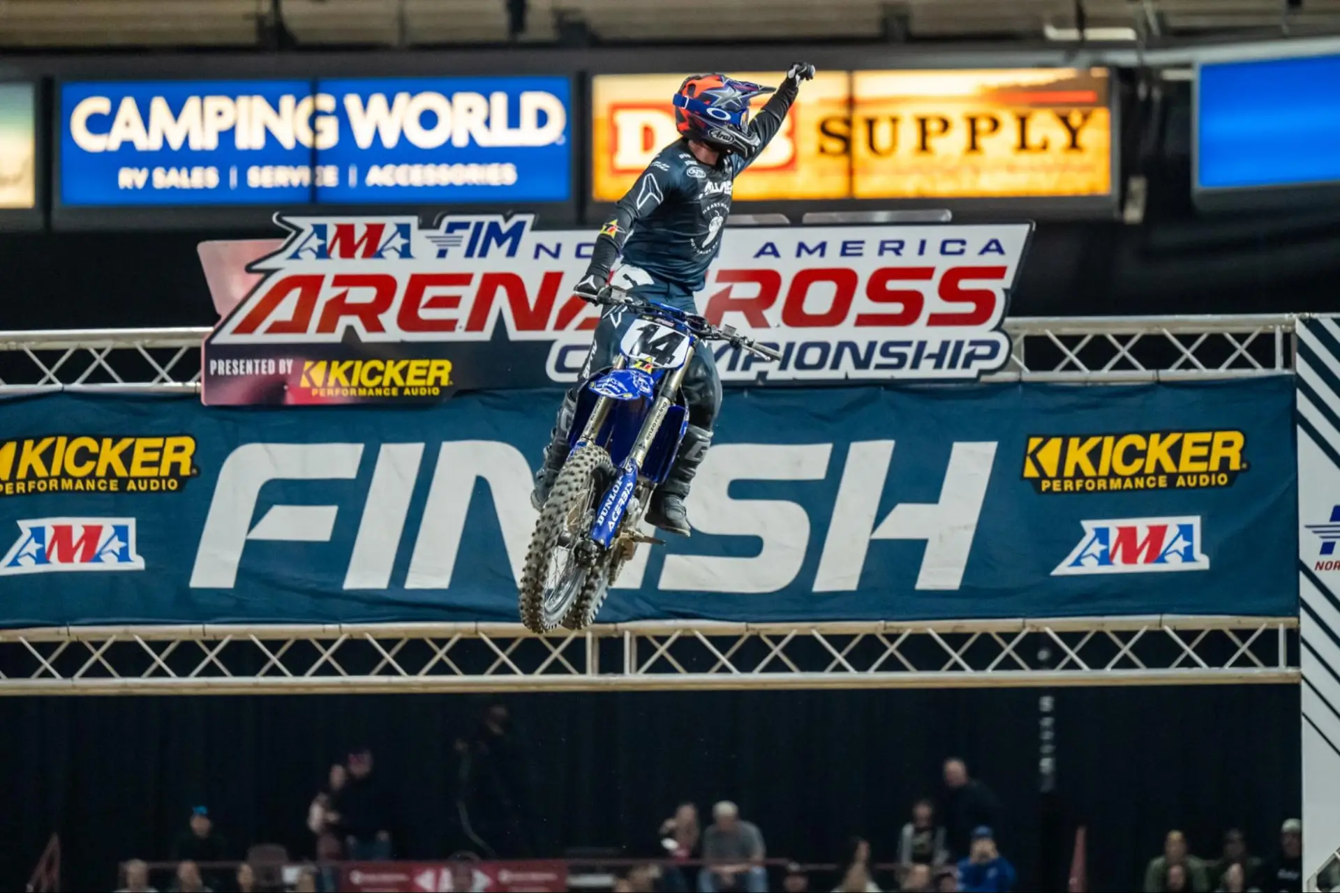 Robbie Wageman celebrates over the finish line