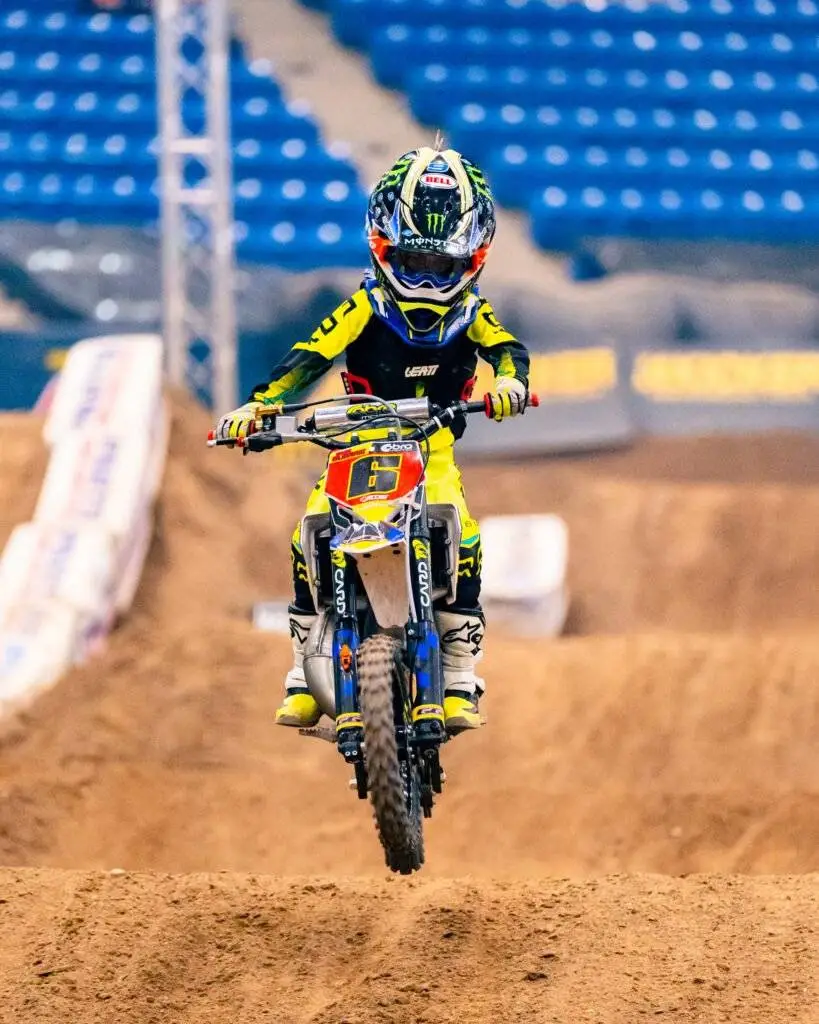 A young rider going through the rhythm section in an AMA Arenacross race.